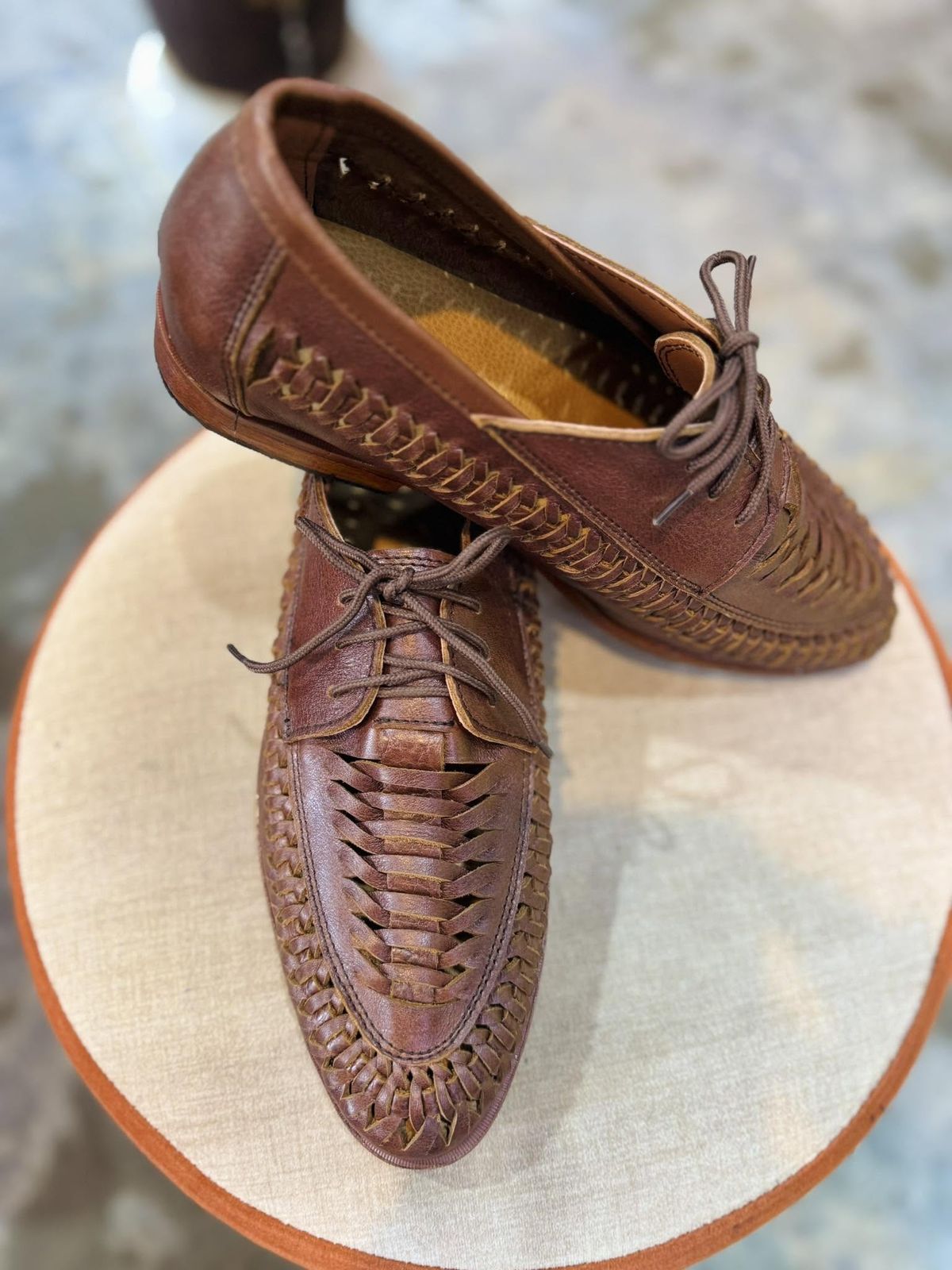 Hand-woven brown leather loafers made at Bison Leather Shop in Hội An